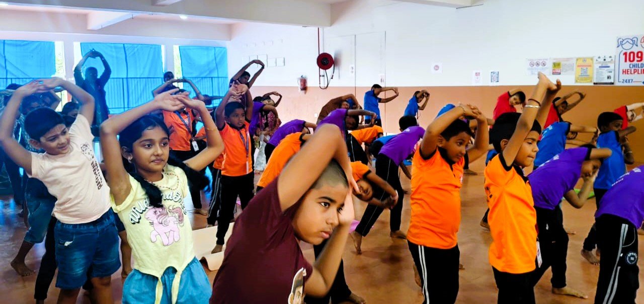 Students doing asanas